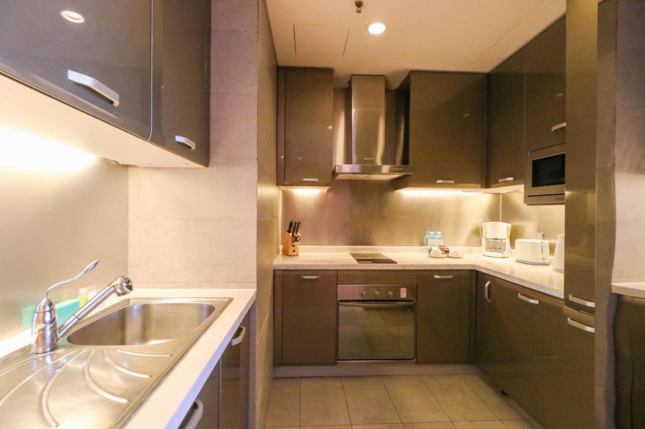 Ascott Raffles City Pechino Esterno foto