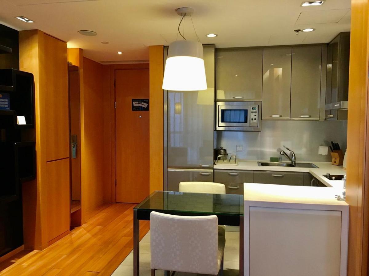 Ascott Raffles City Pechino Esterno foto