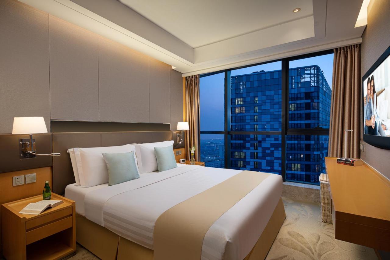 Ascott Raffles City Pechino Esterno foto