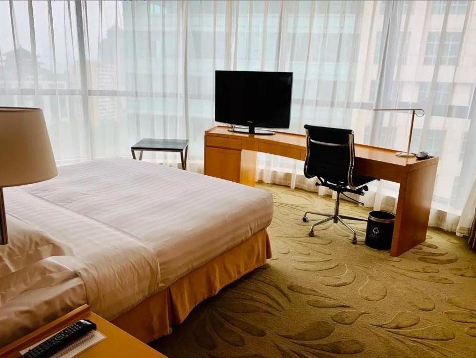 Ascott Raffles City Pechino Esterno foto