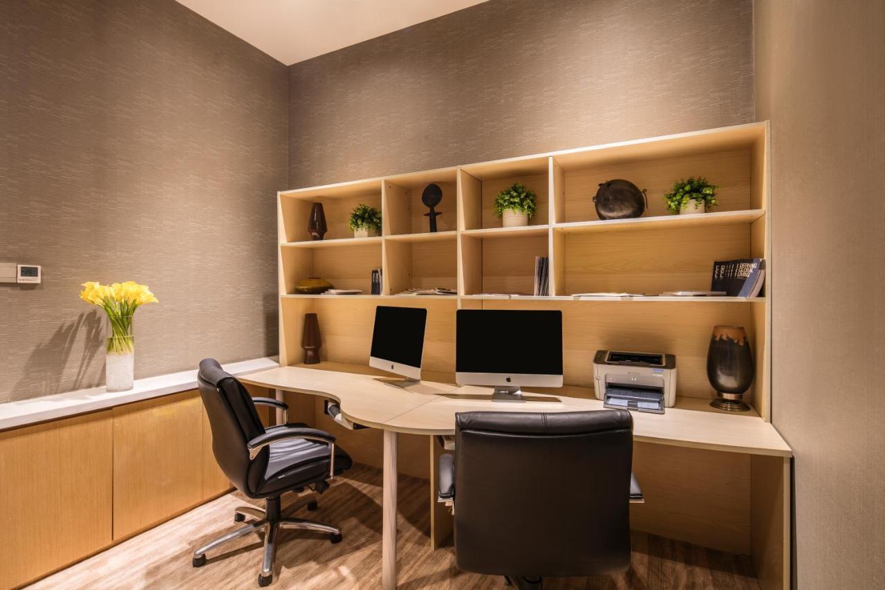 Ascott Raffles City Pechino Esterno foto